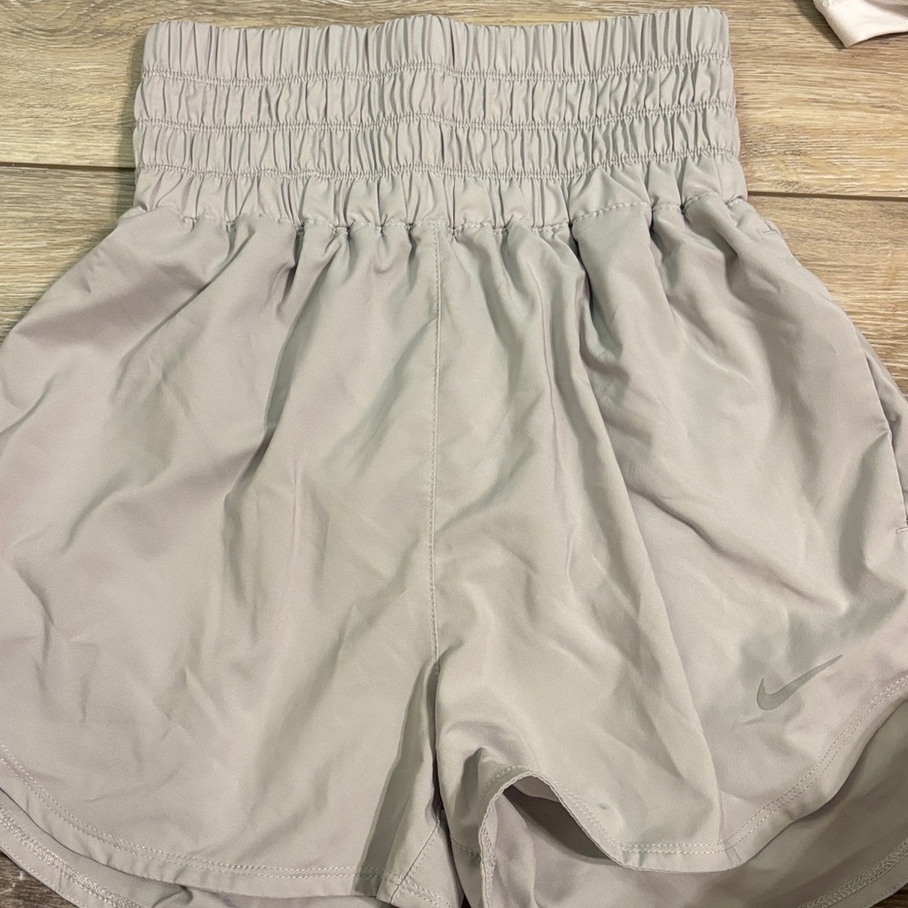 Nike Women's High-Rise Light Gray Athletic Shorts with Smocked Waistband